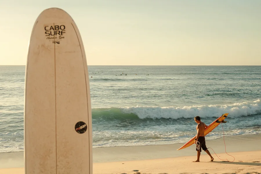 Cabo Surf board on the beach at golden hour